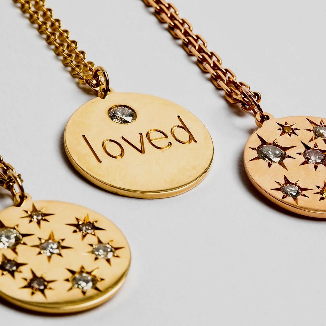 Gold and diamond pendants by Genevieve Lau